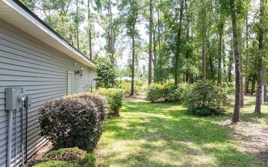 Gorgeous home in a vibrant 55+ community nestled near the