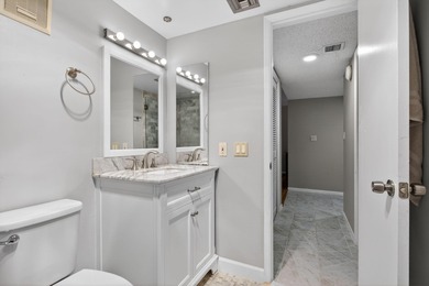 Move-in ready 2BR/2BA Palm Aire condo with expansive views. The