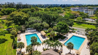 Move-in ready 2BR/2BA Palm Aire condo with expansive views. The
