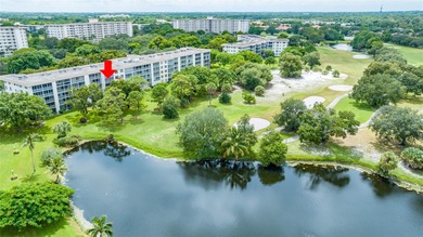 Move-in ready 2BR/2BA Palm Aire condo with expansive views. The