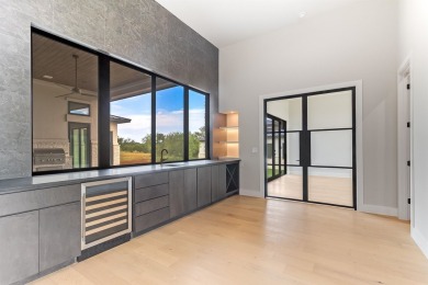 Welcome to 100 Spice Lily, an exceptional new construction home