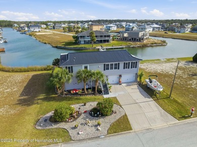 Step inside and experience a waterfront home in Hernando Beach