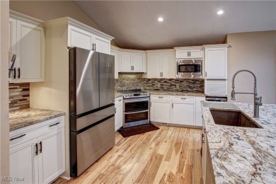 Rare find in this extensively renovated single family 4/5