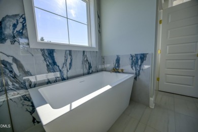 Custom-built 4BR/4.5BA coastal home in a sought-after North