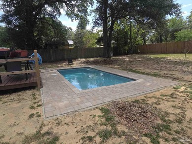 3 Bedrooms, 1 1/2 baths, inground pool that is about 1 year old