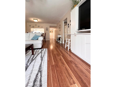 Gorgeously remodeled, turnkey-furnished corner condo with
