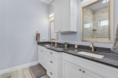 This exceptional, like-new ICF construction pool home, built in