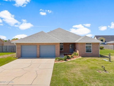 Beautiful 3 bedroom 2 bath 2,175 sf brick one owner home with