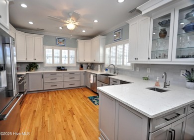 This beautifully custom-built 5-bedroom, 4.5-bath deep water