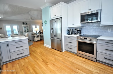 This beautifully custom-built 5-bedroom, 4.5-bath deep water