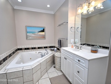 This beautifully custom-built 5-bedroom, 4.5-bath deep water