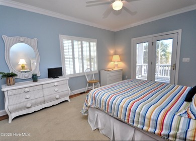 This beautifully custom-built 5-bedroom, 4.5-bath deep water