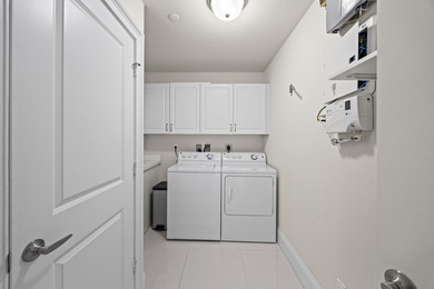 Impeccable Waterfront 3BR, 2.5BA Bay Colony end-unit condo with