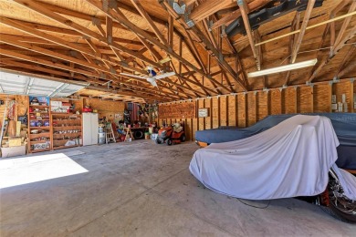 This property includes FIVE TOTAL GARAGE SPACES!! Welcome to