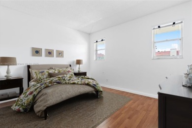 Enjoy peaceful lake views from this bright and quiet 2-bed