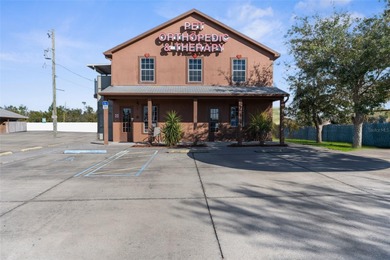 LARGE COMMERCIAL BUILDING for sale directly on US 19/Commercial