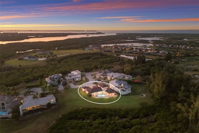 DIRECT BAYFRONT CUSTOM BUILT HOME IN GATED PALMA SOLA POINTE!