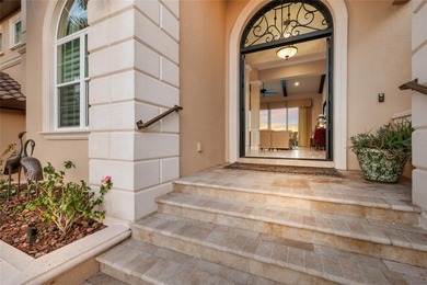 DIRECT BAYFRONT CUSTOM BUILT HOME IN GATED PALMA SOLA POINTE!