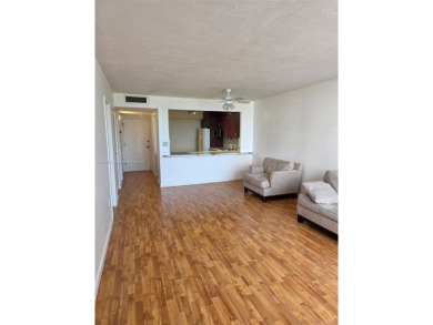 Charming 1/1 Condo with Converted Den & Partial Water View in