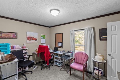 Escape to your own private retreat on over an acre of wooded