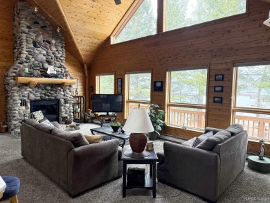 MICHIGAN WATERFRONT HOME FOR SALE! Nestled along the pristine