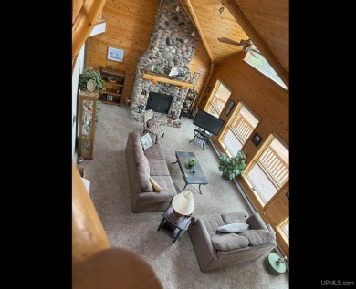 MICHIGAN WATERFRONT HOME FOR SALE! Nestled along the pristine