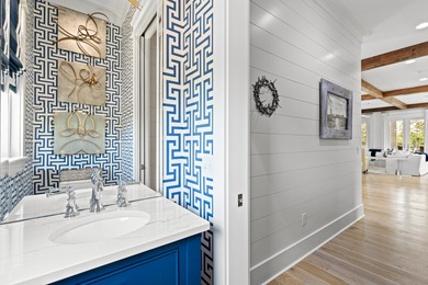 Few homes capture the essence of ultra-luxury coastal elegance