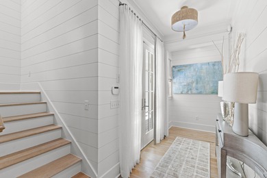 Few homes capture the essence of ultra-luxury coastal elegance