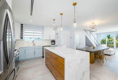 Oceanfront living, elevated. Enjoy expansive, protected views