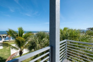 Oceanfront living, elevated. Enjoy expansive, protected views
