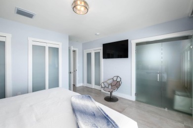 Oceanfront living, elevated. Enjoy expansive, protected views