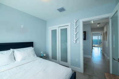 Oceanfront living, elevated. Enjoy expansive, protected views