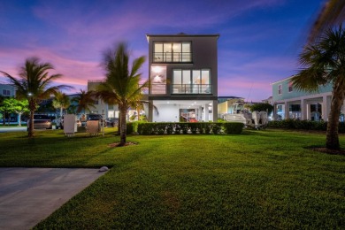 Oceanfront living, elevated. Enjoy expansive, protected views