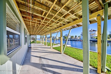 AMAZING INVESTMENT OPPORTUNITY! WATERFRONT GULF-ACCESS TROPICAL