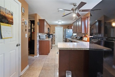 Discover this well-maintained 3-bedroom, 2-bath home on Lowry