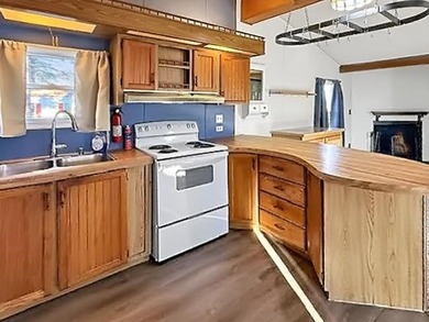 Welcome to 6 North Cranberry Lane, a spacious and affordable