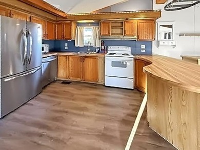 Welcome to 6 North Cranberry Lane, a spacious and affordable