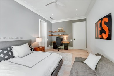 Set on a rare, oversized 56,192 SF lot in one of Coral Gables'