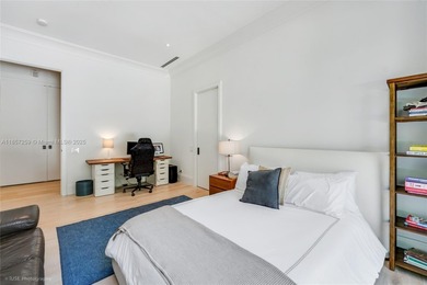 Set on a rare, oversized 56,192 SF lot in one of Coral Gables'