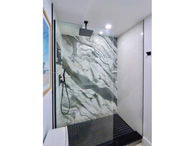 Welcome to this Luxurious Completely Remodeled Art Deco Home in