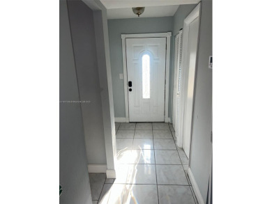 This spacious 2 bedroom condo, is securely located in a gated