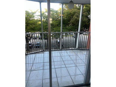 This spacious 2 bedroom condo, is securely located in a gated