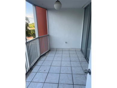 This spacious 2 bedroom condo, is securely located in a gated