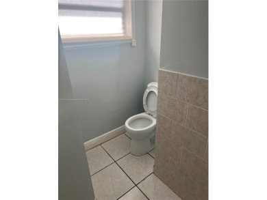 This spacious 2 bedroom condo, is securely located in a gated