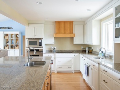 Welcome to 5095 Joewood Drive, a coastal retreat in the