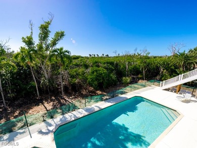 Welcome to 5095 Joewood Drive, a coastal retreat in the