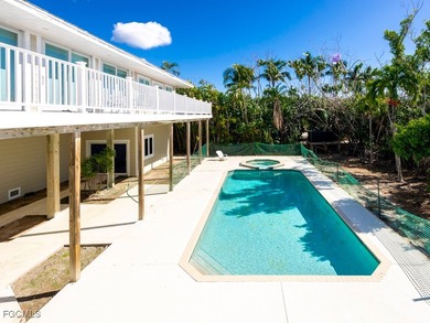 Welcome to 5095 Joewood Drive, a coastal retreat in the