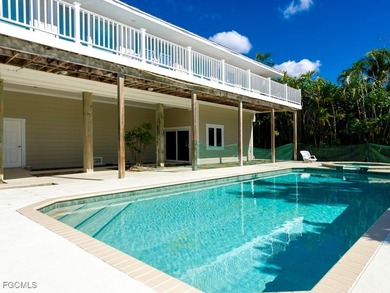 Welcome to 5095 Joewood Drive, a coastal retreat in the