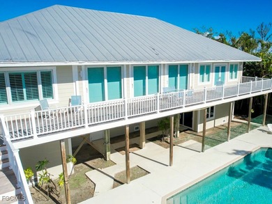 Welcome to 5095 Joewood Drive, a coastal retreat in the