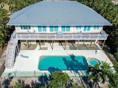 Welcome to 5095 Joewood Drive, a coastal retreat in the